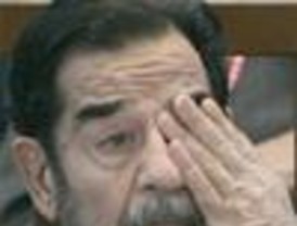 Saddam Hussein está 